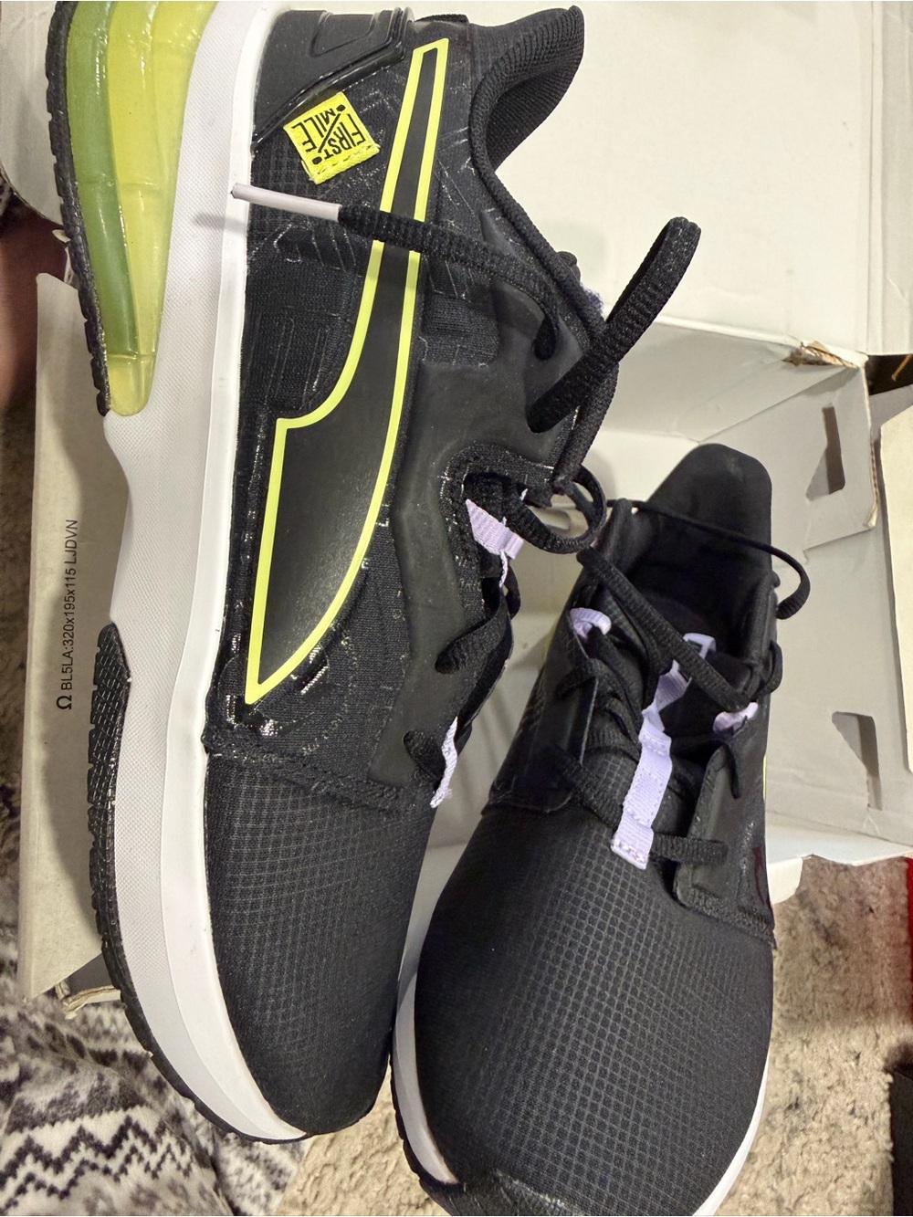 Nike Black Sneakers with Neon Yellow Accent